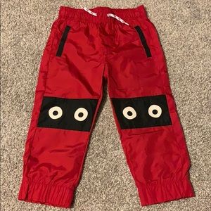 Red nylon toddler pants